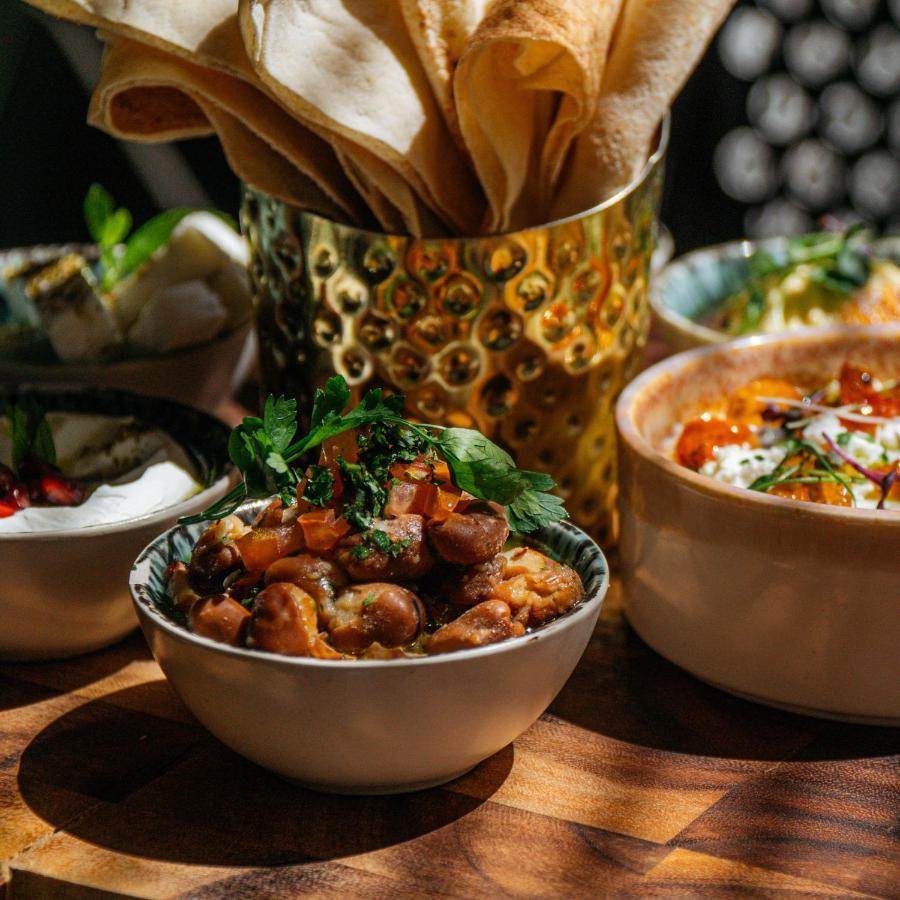 Somerset West Bay Doha Bagian luar foto A bowl of hummus