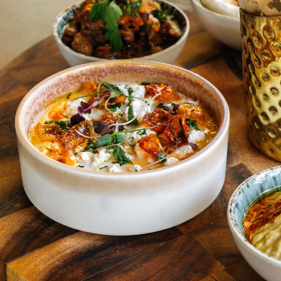 Somerset West Bay Doha Bagian luar foto Labneh with olive oil, sumac, and olives