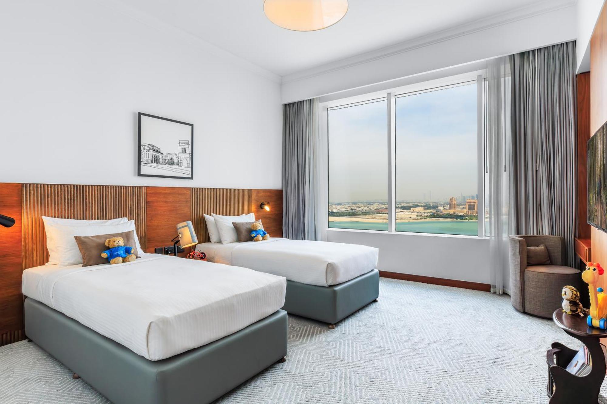 Somerset West Bay Doha Bagian luar foto Deluxe room