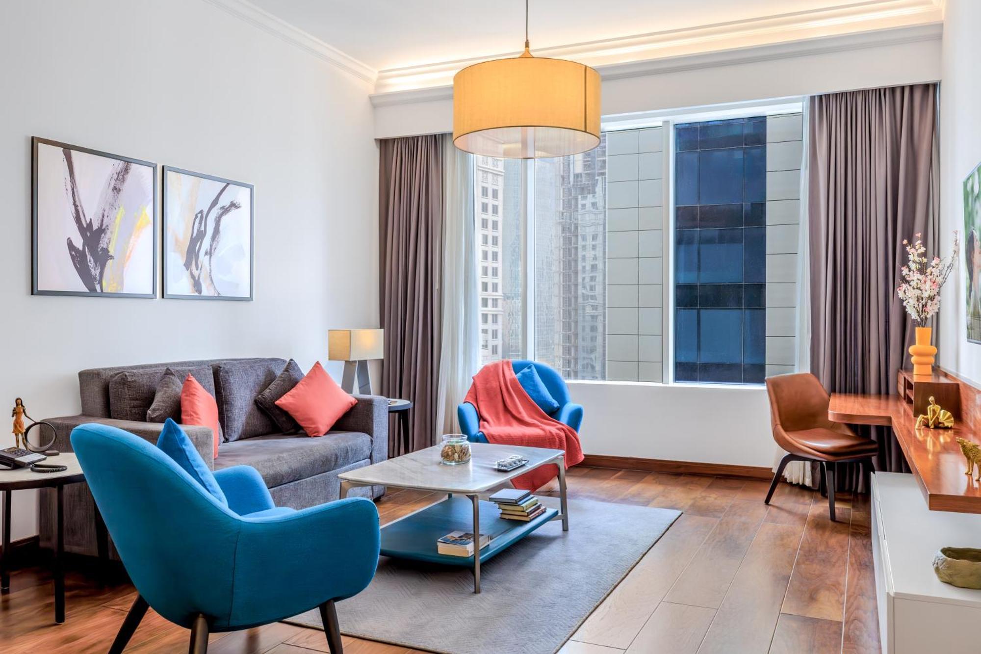 Somerset West Bay Doha Bagian luar foto Living room