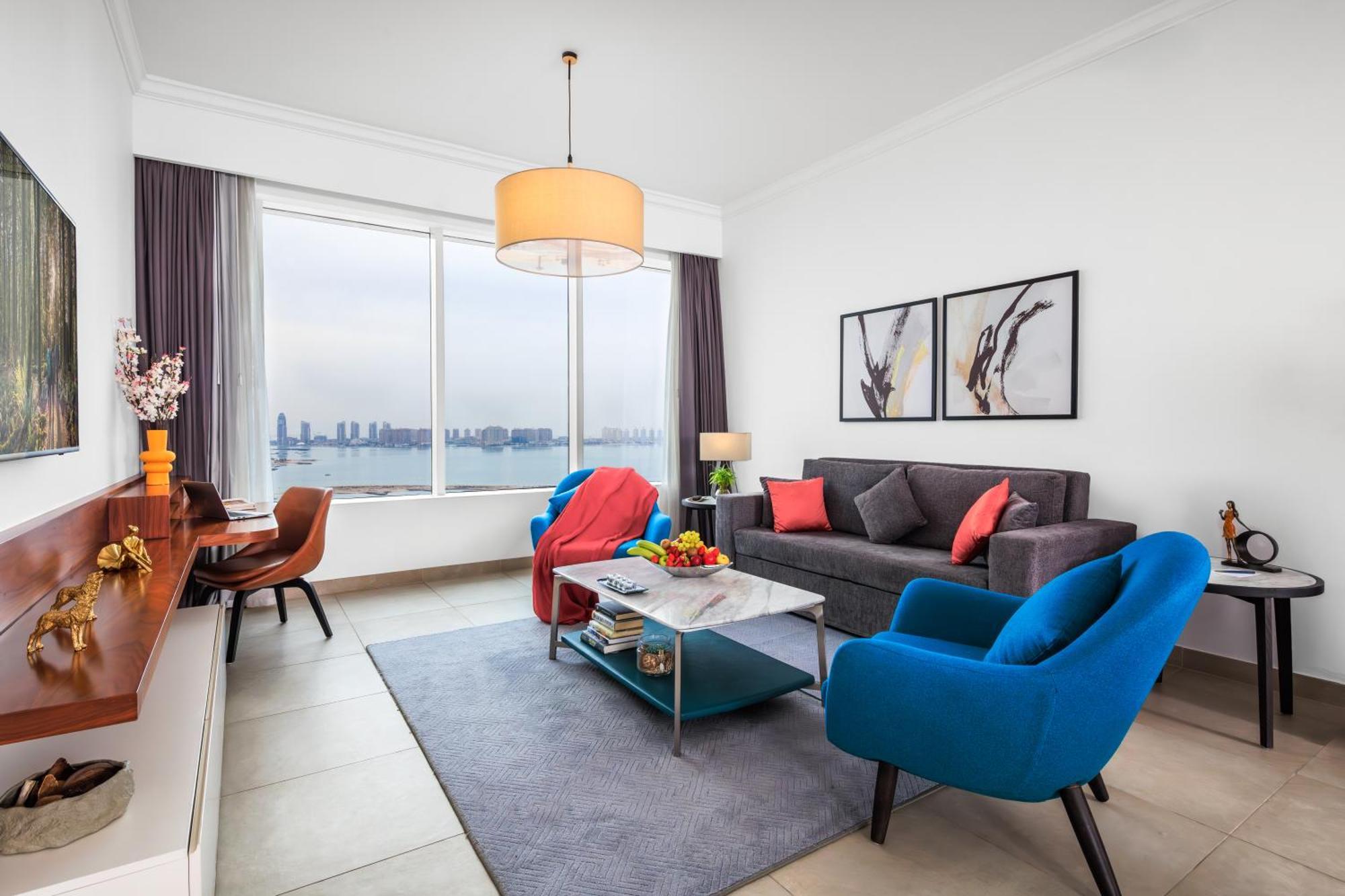 Somerset West Bay Doha Bagian luar foto Living room