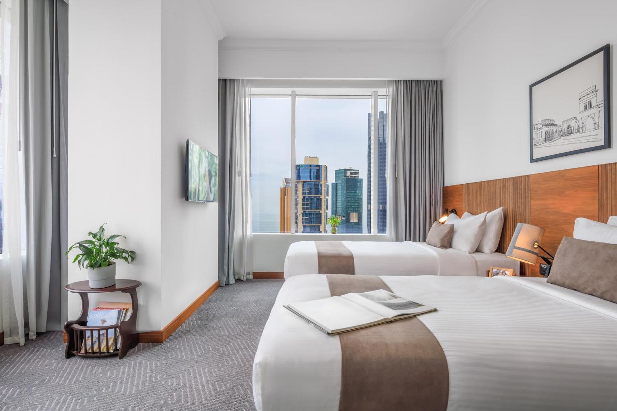 Somerset West Bay Doha Bagian luar foto Deluxe Room